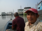 France tourist and me on Traditional Boat on Sunda Kelapa River.